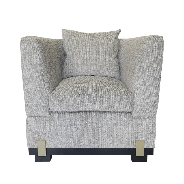 It is all in the details with the Chandler armchair. The super comfortable curved back and luxurious feather wrapped foam seat cushion sit atop a solid beechwood plinth with solid brass detailing strips. A perfect space enhancer.