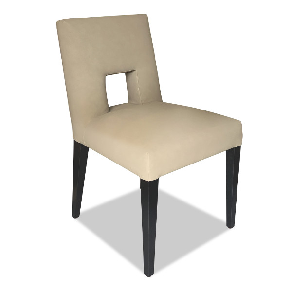 A classic shape the Hirst dining chair brings an essence of modernism and pop culture to the dining table. Superbly comfortable with carefully hand tailored seat and back.