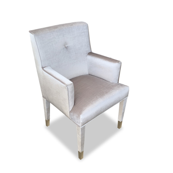 A fully upholstered dining chair with elegant upholstered legs and real brass slipper cups. The Seward is an excellent choice to bring a lot of fabric into the room.