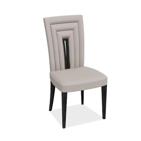 A classic example of Art Deco the Huxley dining chair features fluted panels that expand outwards as you ascend the piece. A show wood centre piece framed with brass finishes off this timeless piece.