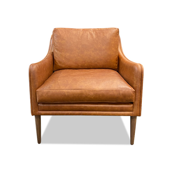 A Mid Century inspired chair the Garrett is best dressed in a beautiful vintage leather. The feet are from solid timber in your choice of species and the seat and back cushion are formed from 100% feather to ensure a soft and embracing comfort.
